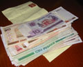 About £2 worth of rubles - take paperclips!